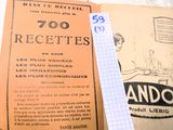 un livre sur lequel est posé un bout de papier
