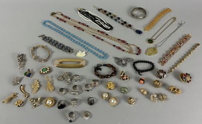 many different types of jewelry on the table