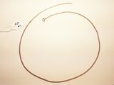 a picture of a necklace with a chain attached to it