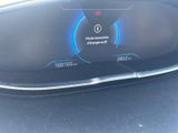 the dashboard of a car with a digital display on it