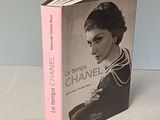 a book that has a picture of a woman in a dress on it
