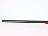 a rifle with a wooden barrel on a white background