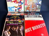 quatre disques vinyles, dont les Rolling Stones, les Rolling Stones et les Rolling Stones