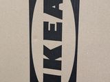 a close up of a cardboard box with a logo on it