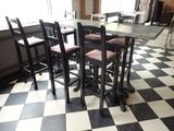 a black and white checkered floor in a restaurant