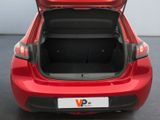 the back end of a red car with its trunk open