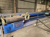 a machine that is working on a piece of metal