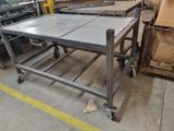 a table that is sitting in the middle of a room