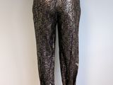an image of a mannequin mannequin wearing a black and silver pants