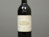 a bottle of wine that is sitting on a table