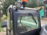 a truck that has a light on top of it