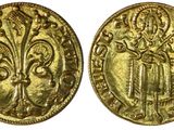 une pièce d'or sur laquelle figure l'image d'un homme