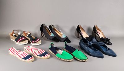 neuf paires de chaussures pour femmes alignées en rang