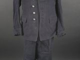 an image of a suit with buttons on a mannequin base