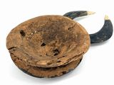 an old cast iron frying pan with a wooden handle