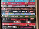 a lot of dvds in a box on the table