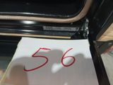 a piece of paper with the number 56 on it