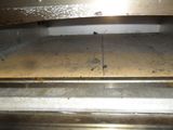 a close up view of an oven with a lot of dirt on it