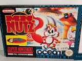 une image représentant une boîte de jeux Nintendo sur laquelle figure l'image d'un chat