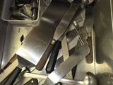 a lot of kitchen utensils that are in the sink
