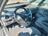 a car with a steering wheel and a dash board
