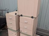 many drawers and cabinets stacked on top of each other