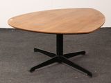 an image of a table with a wooden top and black metal legs