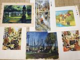 several pictures of paintings are displayed on a tile floor in a room
