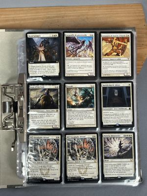 a close up of a binder with a bunch of cards on it