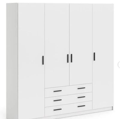 a close up of a white wardrobe with drawers and drawers