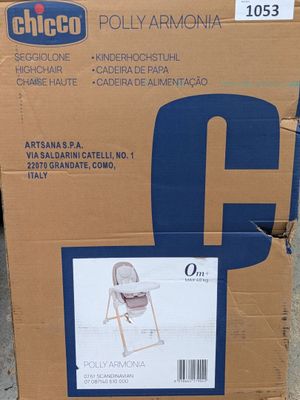 cardboard box with a picture of a baby ' s highchair in it