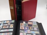 a lot of stamps in a book on the table