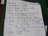 un bout de papier sur lequel figure une note manuscrite