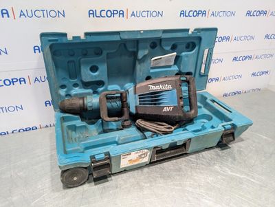 a blue tool box with a drill and other tools in it