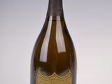 an old bottle of champagne on a white background
