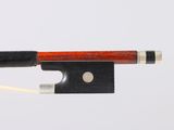 an image of a violin bow with a string attached to it