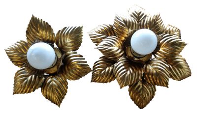 pair of gold and white flower earrings with pearls on them