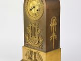 a clock that is sitting on top of a table