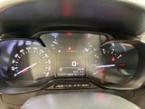 a close up of a car dashboard with a speedometer and gauges