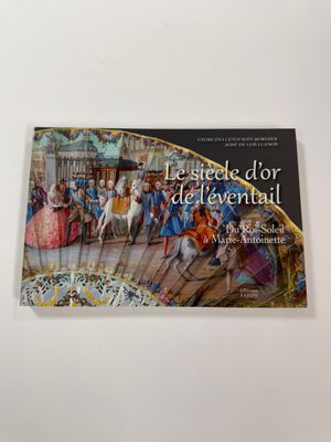 une image représentant un livre sur lequel figure une foule de personnes