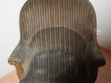 a chair that is sitting on a hard wood floor