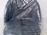 a plastic chair that has been wrapped up in plastic