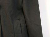 an image of a black coat with buttons on the lapel