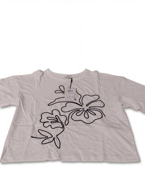 the t - shirt has a drawing of a flower on it