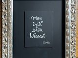 a picture of a chalkboard with a quote written on it