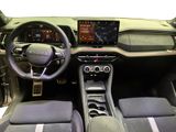 the interior of a car with a steering wheel, dashboard, and dash board