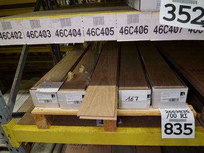 a lot of wooden planks on the shelves in the store