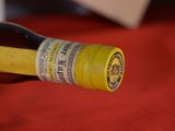 a bottle of wine that is sitting on a table