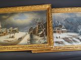two paintings of a winter scene on a table with a chair