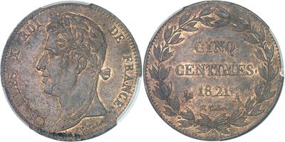 a close up of a coin with a woman ' s face on it